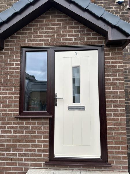 Cream composite door with brown frame fitted by Bleaklow Windows