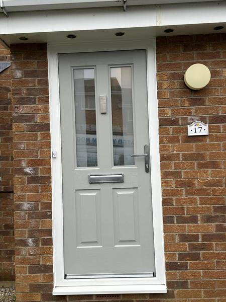 Grey composite door fitted by Bleaklow Windows